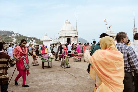 Parasnath, Giridih, Jharkhand, India May 2018 - Hindu Jain pilgrims people walking around Shikharji Temple Lawn area. Temple is popular among Jain followers. A Jharkhand Tourism Photography.のeditorial素材