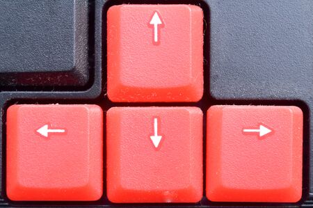 Cursor key, direction keys or navigation arrow keys in numeric pad on computer keyboards. It is made up of four keys the left arrow (back arrow), up arrow, down arrow, and right arrow (forward arrow).の写真素材