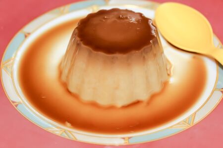 Fluffy moist Vanilla Yellow Cake with Chocolate Frosting, a baked pastry item, the perfect Birthday Homemade Cake, a homemade grandmother's recipe.の写真素材