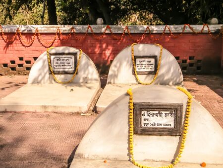 Samta Village, Howrah district, West Bengal, India May 2019 - Old Grave yard burial place with white grave stones of famous Bengali novelist Sarat Chandra Chattopadhyay. A heritage-historical site of protected under the West Bengal government.のeditorial素材