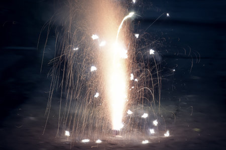 Bright and colorful fireworks showing display at night in City Street during Diwali festival...