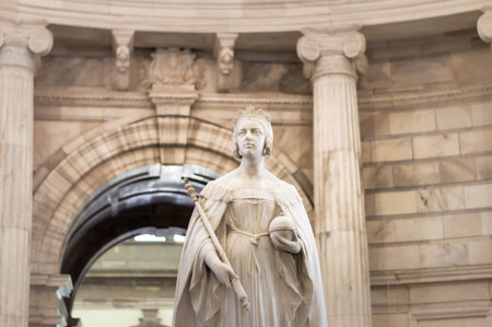 Queen Victoria statue inside Victoria memorial in Kolkata. Majestic on a marble pedestal, statue sculpture art by Thomas Brock. Victoria Memorial Hall, Calcutta (Kolkata), India India, Asia May 2019のeditorial素材