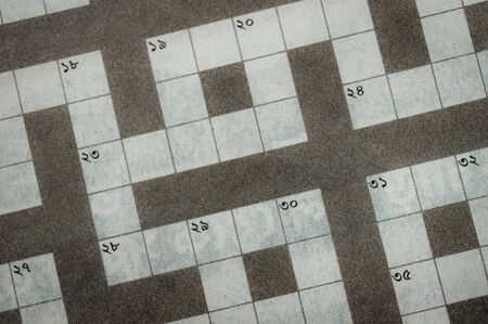 Crossword puzzle brain teaser. Number game logic puzzle. Newspaper typescript. Square composition flat design grid pattern. Leisure games, Education Teamwork, Expertise, intelligence Wisdom backgroundの写真素材