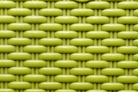 Chinese seamless pattern on green color plastic screen. Close up. Abstracts and backgrounds. Repeat vector knitted Design and pattern element. Net grid chain pattern cage industrial object.の写真素材