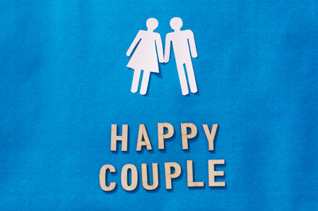 Happy Human Couple Paper Craft Mockup on Blue background. Origami Papercraft decorative shapes and...