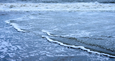 Blue Sea waves flowing on ocean floor. Full frame. Nature background.の写真素材