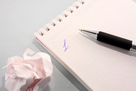 The handle and notebook and the rumpled paper. To plan, doubtの写真素材