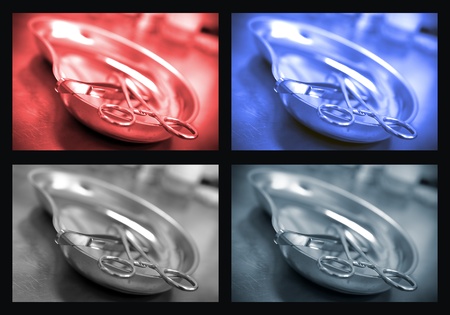 surgical instruments in a metal bowl  A set of four different toned photo Medical background の写真素材