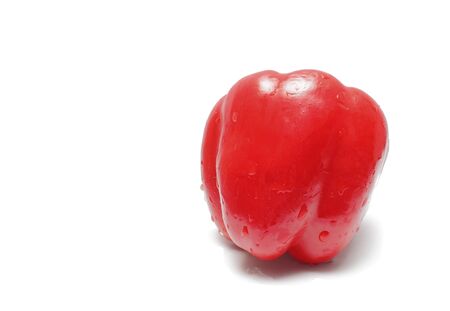 red bell pepper isolated on a white background with space for your text の写真素材
