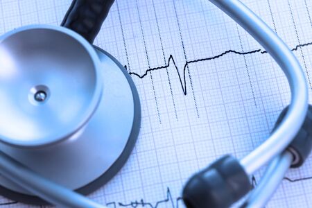Diagnostics in cardiology. Stethoscope on ECG paperの写真素材