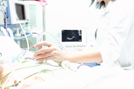 emergency ultrasound of the patient in the ICU の写真素材