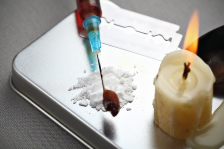 Attributes of addiction. Syringe, a candle, drug,Â  blade. の写真素材
