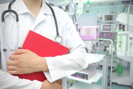 doctor with a book in the ICU の写真素材