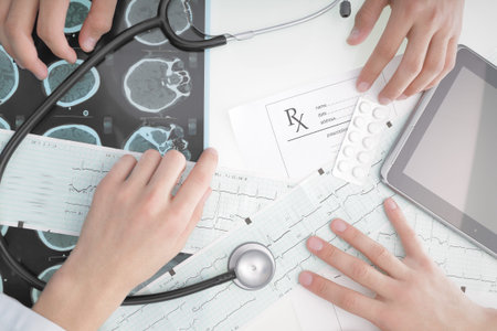 Doctors working at the desk in the hospital