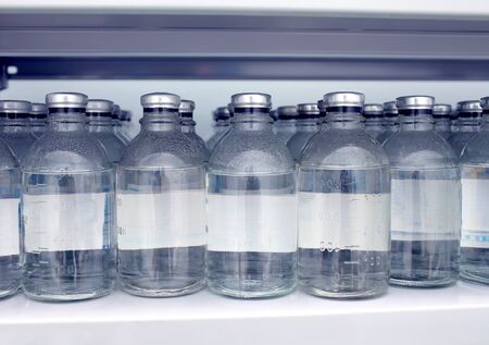 Warehouse bottles of saline solution in the hospitalの写真素材
