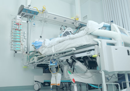 Modern bed in the intensive care with patient