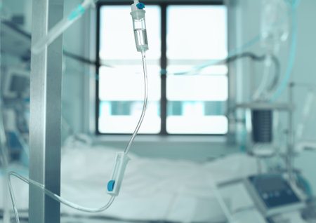 Medical drip macro against the window in the hospital ward