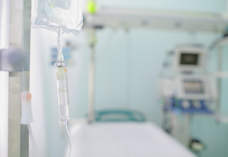 Iv drip on the background of blurred ward. Concept of serenity in hospitalの写真素材