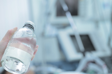 Preparations for infusion therapy in hospital ward.の写真素材