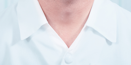 Portrait of male doctor with part of neck and chest.の写真素材