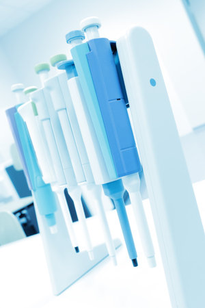 Set of electronic droppers in lab.