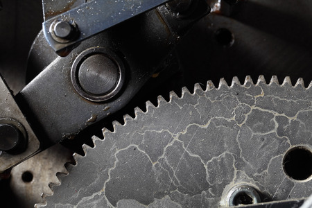 Old dirty gearwheel in work.の写真素材
