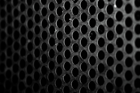 Cellular metal sheet, textured background.の写真素材