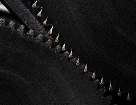 Coupled gearwheels in action closeup.