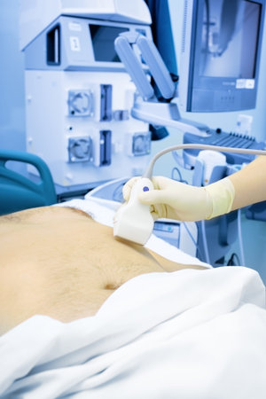 Providing ultrasonic examination in hospital.の写真素材