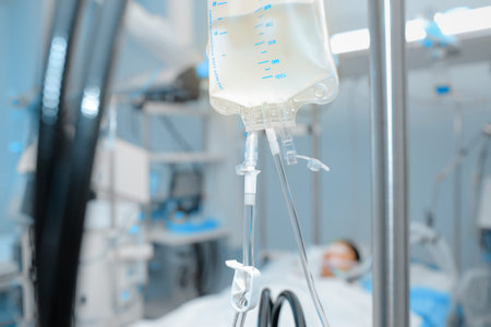 Intravenous system dripping to the patient in ICU.