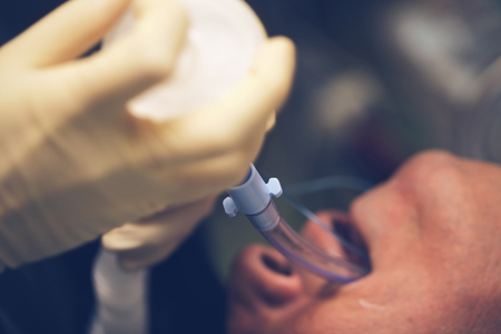 Intubating patient in the critical care unit.の写真素材