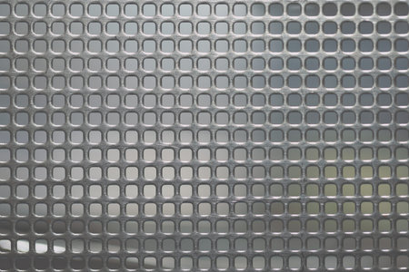 Silver grid as a textured background.