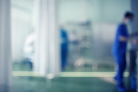 Medical room in the hospital with working personnel, unfocused background.の写真素材