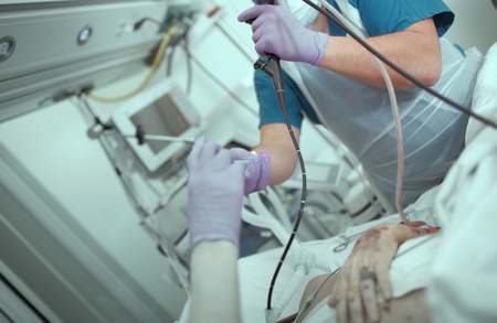 Collaborative work of medical doctors during endoscopic operation in the patient ward.の写真素材