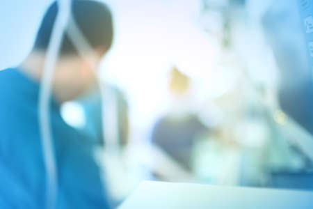 Abstract figure in a medical setting. The doctor at work. Blurred defocused backgroundの写真素材