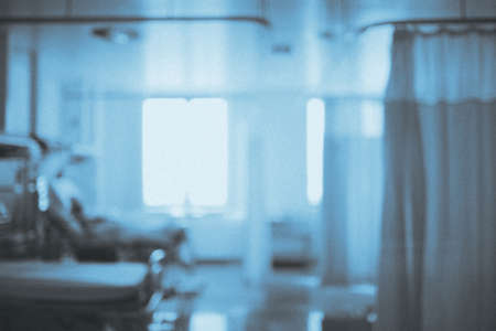 Dull ward in a hospital. Blue brown medical blur defocussed backgroundの写真素材