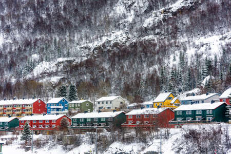 Coloured homes in the snowの写真素材