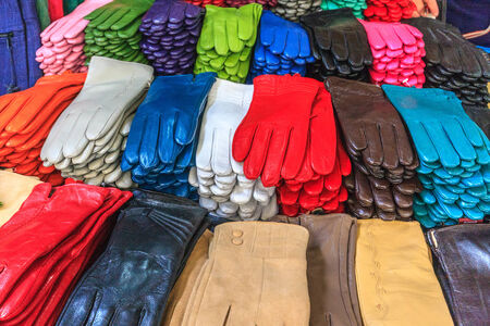 Rows and rows of gloves in various coloursの写真素材