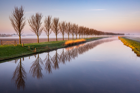 Early morning by a Dutch Canalの写真素材