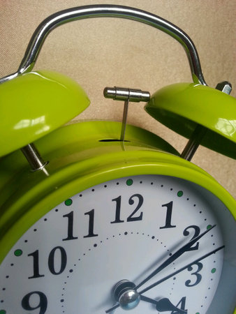 Alarm clock in green colorの素材
