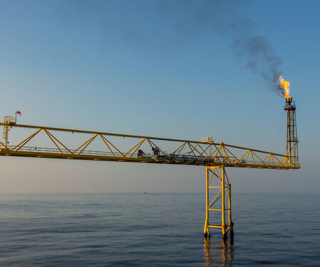 blue sky with flare over seaの写真素材