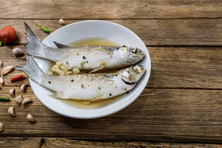 fresh Mullet fish boiled with salt, garlic and pepper