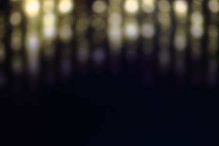 Bokeh lights. Beautiful Christmas light gold defocused lights backgroundの写真素材
