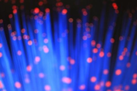 Abstract background out of focus blue purple fiber optics close up, modern computer communication...