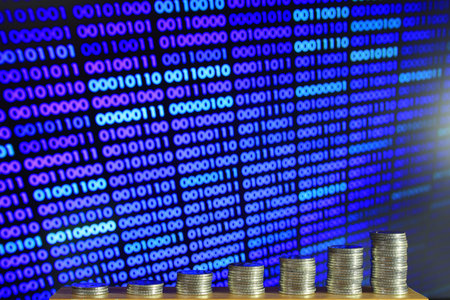 secured internet business. big coin piles in front of blue binary code computer screen. rich through...