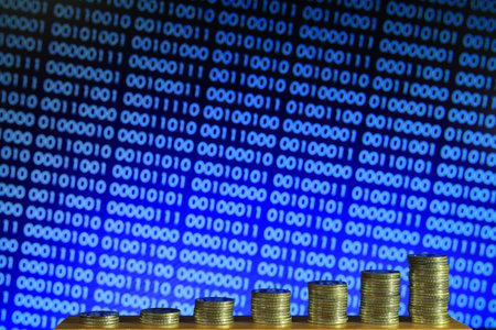secured internet business. big coin piles in front of blue binary code computer screen. rich through...