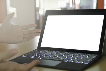 business presentation on screen. mock up blank laptop monitor display for copy space. notebook on...