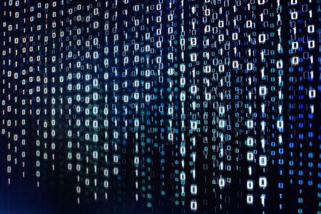 computer data matrix. vertical digital binary code moving motion downward. light up blue one and zero text flowing down. black background space with multiple layers coding.の写真素材