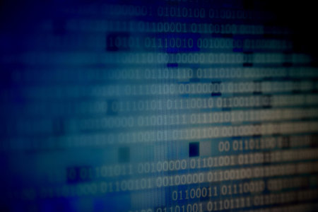computer block of binary code on blue pixel background. light and dark multiple shade and tone of blue pixel blocks. soft focus, selective focus and bokeh defocused photo effects.の写真素材
