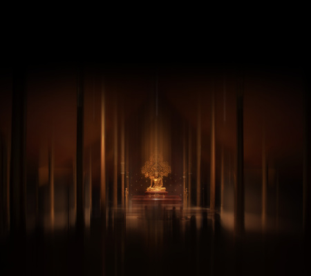 Gautama Buddha sculpture meditating. gold color statue of lord Buddha in Thai art style. Abstract motion blur Sacred Buddhist image in an old wooden temple. peace of mind and soul conceptsの写真素材